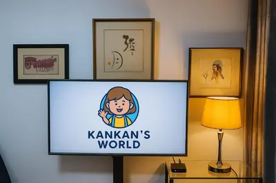 a screen with a sign on a wall with framed pictures at \u5eb7\u5bbf \u89c0\u703e\u9f4b Guan Lanzhai Studio in Sampong
