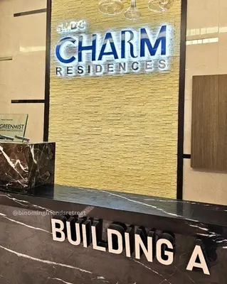 a sign for a building with a sign for churn refugees at Blooming Friends Retreat in Manila
