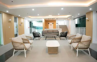 a waiting room with chairs and a couch at I-LAND Residences Sucat near NAIA w Wifi free parking in Manila