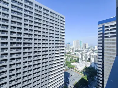 an overhead view of a large building in a city at 1BR Condotel with Balcony at FAME Residences #FM44-1 in Manila