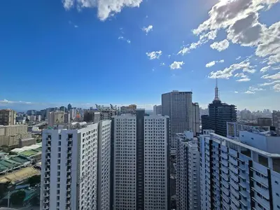 a view of a city skyline with tall buildings at 1BR Condotel with Balcony at FAME Residences #FM54-1 in Manila