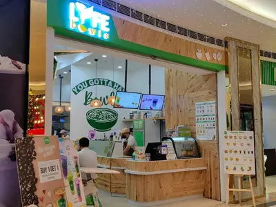 a fast food restaurant with people sitting at a counter at 1BR Condotel with Balcony at FAME Residences #FM58-1 in Manila