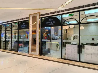 a store front with glass windows in a shopping mall at 1BR Condotel with Balcony at FAME Residences #FM60-1 in Manila