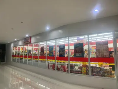 a grocery store aisle with a display of food at 1BR Condotel Ridgewood Towers Near Airport #RW01-1 in Manila