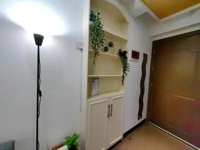 a room with a garage door and plants on the wall at 1BR Condotel Ridgewood Towers Near Airport #RW05-1 in Manila