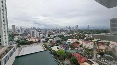 an aerial view of a city with tall buildings at 2BR 90sqm Furnished Condo Shaw Blvd, Mandaluyong in Manila