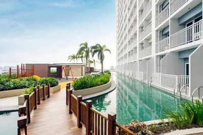 an image of a swimming pool at a hotel at Rhoydez Condotel Breeze Residence in Manila
