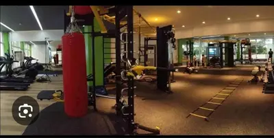 a gym with a punching bag in the middle at Peaceful City View Condo for Rent in Quezon City in Manila