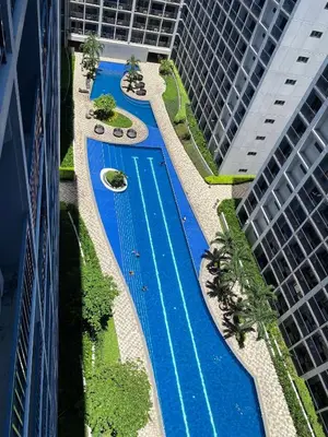an overhead view of a swimming pool between two buildings at AJ Staycation Shore 2 in Manila