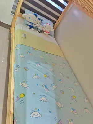 a bunk bed with two stuffed animals on it at Paean's Pods at Bloom in Manila