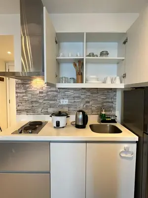 a kitchen with a sink and a counter top at 1BR Condotel in Azure Urban Resort Near NAIA #BH1 in Manila