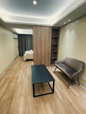 a living room with a couch and a table at Happy Holiday in Manila