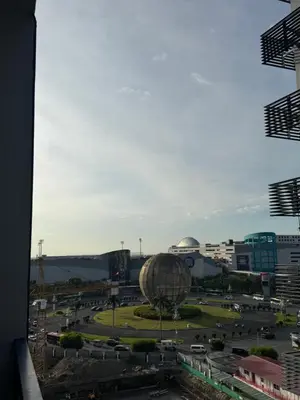 a view of a city with a sphere in a parking lot at R&K Staycation in Manila