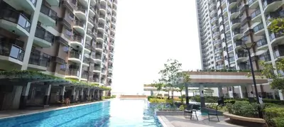 a swimming pool in the middle of a building at Cooper's Place in Manila