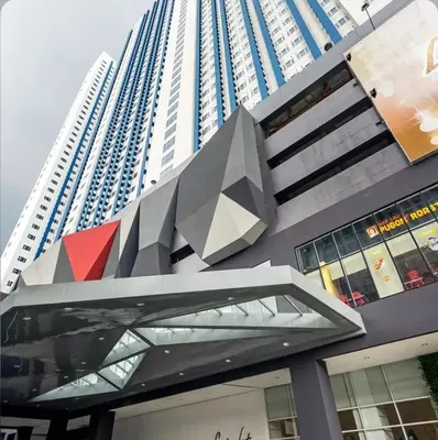 a building with a geometric design on the side of it at Cozy Nook in the City of Mandaluyong in Manila