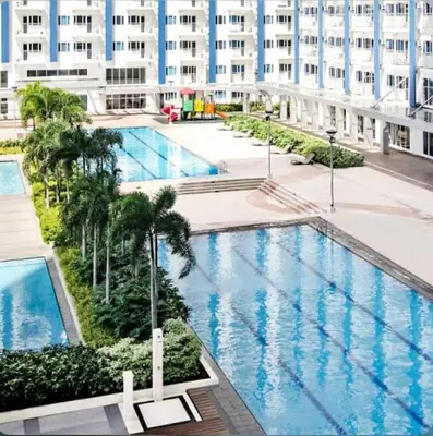 an overhead view of a swimming pool in a building at Cozy Nook in the City of Mandaluyong in Manila