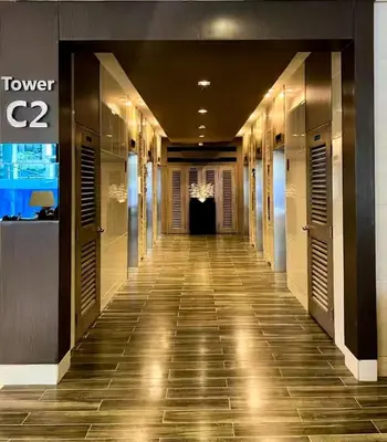 a hallway of a hotel lobby with at SLY Staycation at Shore Residences Mall of Asia in Manila