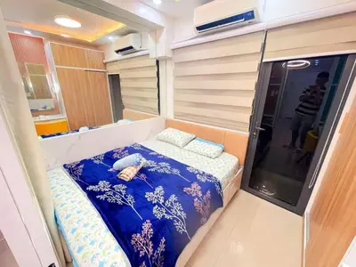 a small bed in the back of an rv at shore 2 tower 3 near moa in Manila