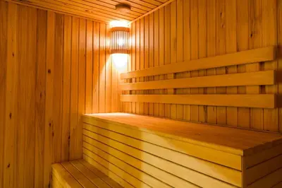 a wooden sauna with a light on top of it at Stay Across NAIA Terminal 3 in Newport City in Manila