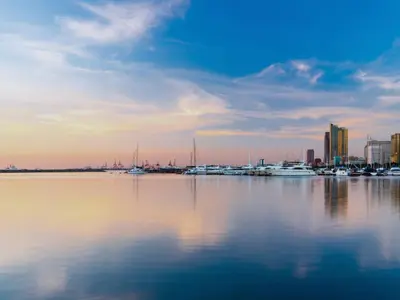 a view of a harbor with boats in the water at City Getaway in the Heart of Entertainment City in Manila