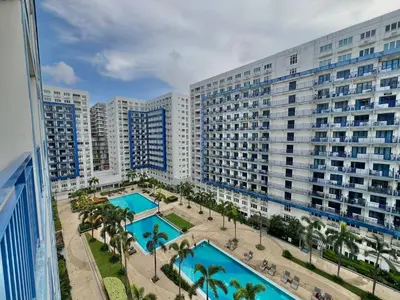 an aerial view of a large apartment building at Studio Condo by Sea Residences near MOA 02 in Manila