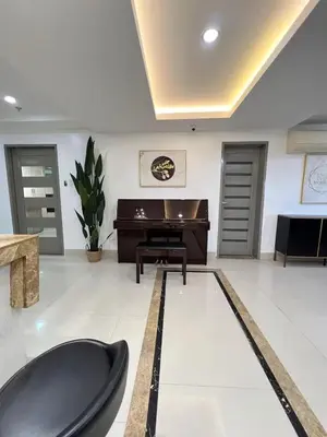 a living room with a pool table and a piano at R&R Entire Rental Unit in Manila