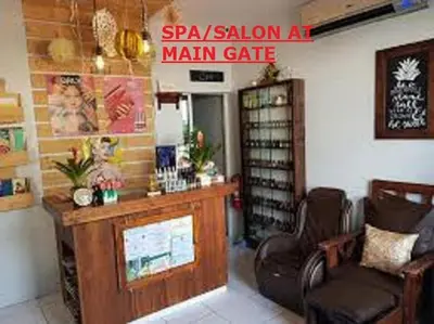 a room with a salon with a main gate at Chateau Elysee A11 near bar resto mall Airport in Manila