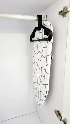 a black and white net hanging on a bathroom wall at Casa Antonio at 8L Two Palm Tree Beside NAIA3 in Manila