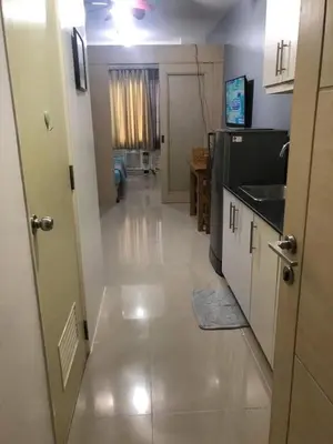a kitchen with a sink and a counter top at Joyce Condo unit Sea Residences in Manila