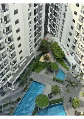 an aerial view of two large apartment buildings at Cozy Urban Staycation Condo Unit in Manila