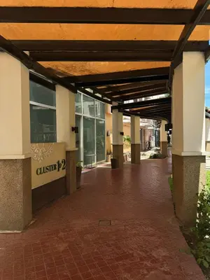 an entrance to a building with a wooden ceiling at Casa Chloe at Holland Park in Biñan