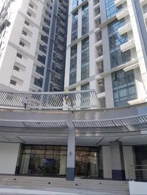 a view of a building with two tall buildings at Chic BGC Stay - Hotel Vibes in Manila