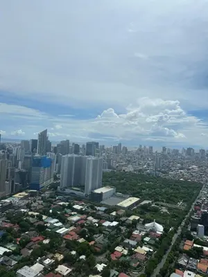 an aerial view of a city with tall buildings at Casa Delantera Karaoke Games Pet Friendly in Manila