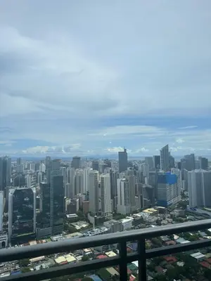 a view of a city from the top of a building at Casa Delantera Karaoke Games Pet Friendly in Manila