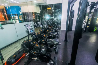 a row of motorcycles parked in a room at The Zen Escape 1BR Makati swim gym park cook 300MB 5940 in Manila