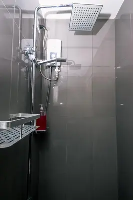 a shower in a bathroom with a glass door at Suite Escape Luxe 1BR Makati condo Getaway Gym Swim Swim 2946 Fast MB in Manila