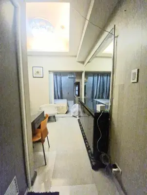 a hallway of a room with a living room at MEZZA TOWER 2 SMARTTV 43inch in Manila