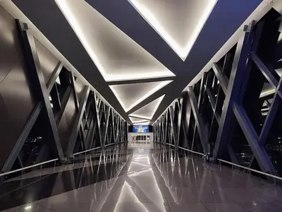 a bridge with a ceiling and a long hallway at One Tree villas - Hyuna Place, Across NAIA T3 in Manila