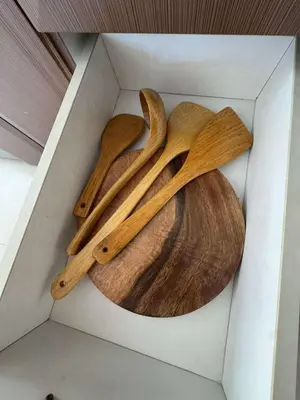 two wooden utensils in a white box at Elegant Suite with Balcony l Free wifi and netflix I Across NAIA T3 Airport in Manila