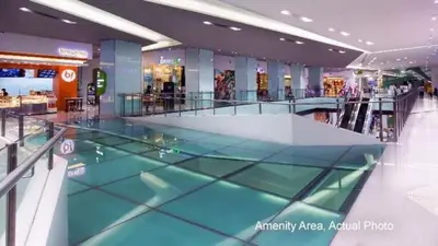 an empty shopping mall with a glass floor at Bernie and Adel's Property Rental in Manila