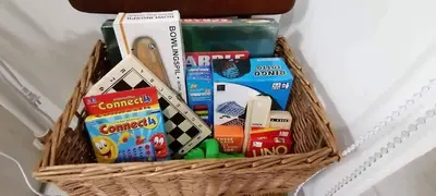 a basket filled with different types of snacks at The Donegal with WI-FI Netflix Parking with fee in Manila