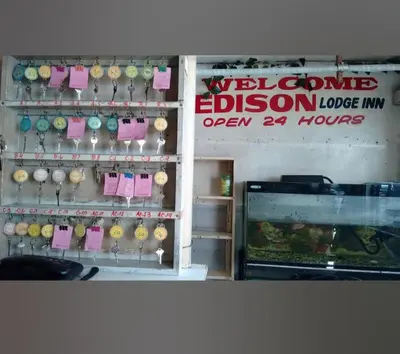 a store with a bunch of balls on a wall at Edison Lodge hotel in Manila