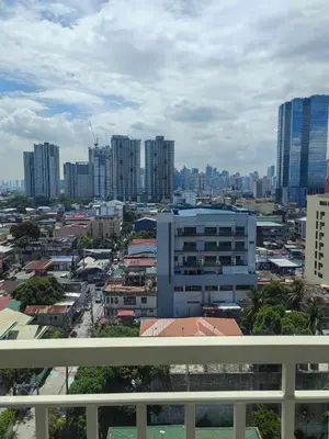 a view of a city with tall buildings at AHD Staycation in Manila