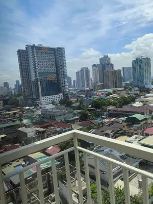 a view of a city with tall buildings at AHD Staycation in Manila