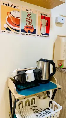 a counter with some pots and pans on it at 1Haven in Pasig CCF Bridgetown in Manila