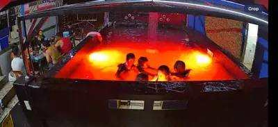 a group of people sitting in a hot tub at Noirescape in Binangonan