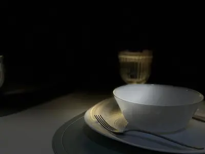 a bowl and a plate with a fork on a table at Comfy Spot Staycation Studio at Kasara Urban Pasig in Manila