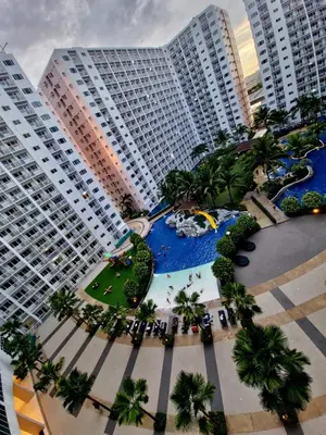 an aerial view of a resort with tall buildings at All I Want Relax at Shore Residences in MOA Complex in Manila