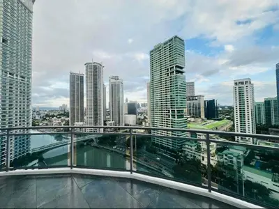 a view of a city skyline with skyscrapers at Novotel Hotel Residences at Acqua- AMOREsuite in Manila