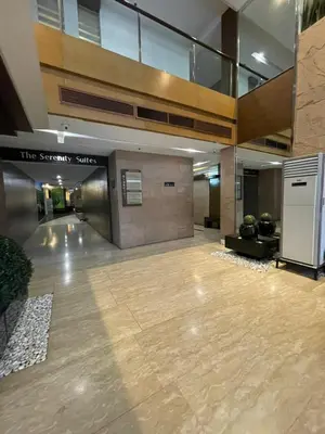 an empty lobby with a large lobby with a lobby at Antel Spa Residences 1908 in Manila